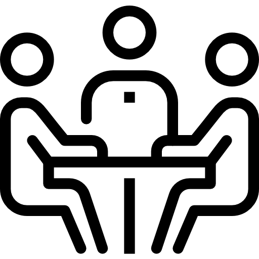 3 People sitting at a table to show a meeting